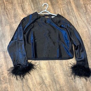 Black silky top with feather sleeve
